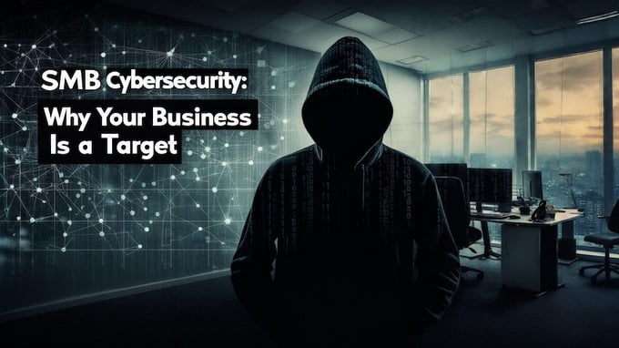A dark, hooded figure stands in an office, symbolizing a cybersecurity threat to small businesses.